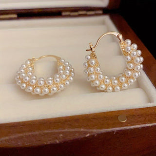 Boucles d'oreilles créoles avec perles superposées