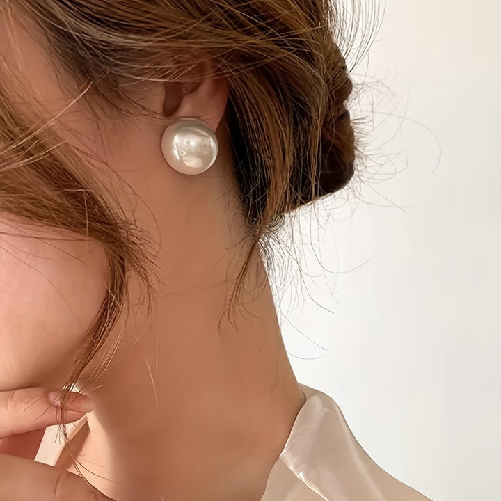 Les Boucles d'Oreilles à Pince avec Perle Statement