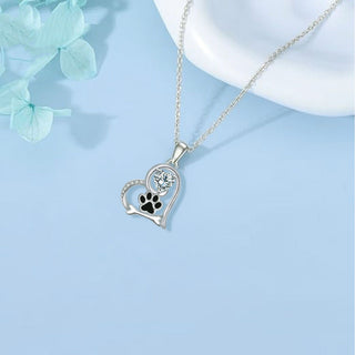 Collier en Argent Fait Main avec Empreinte de Patte de Chien et Détail en Os avec Zirconia