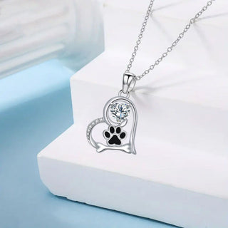 Collier en Argent Fait Main avec Empreinte de Patte de Chien et Détail en Os avec Zirconia