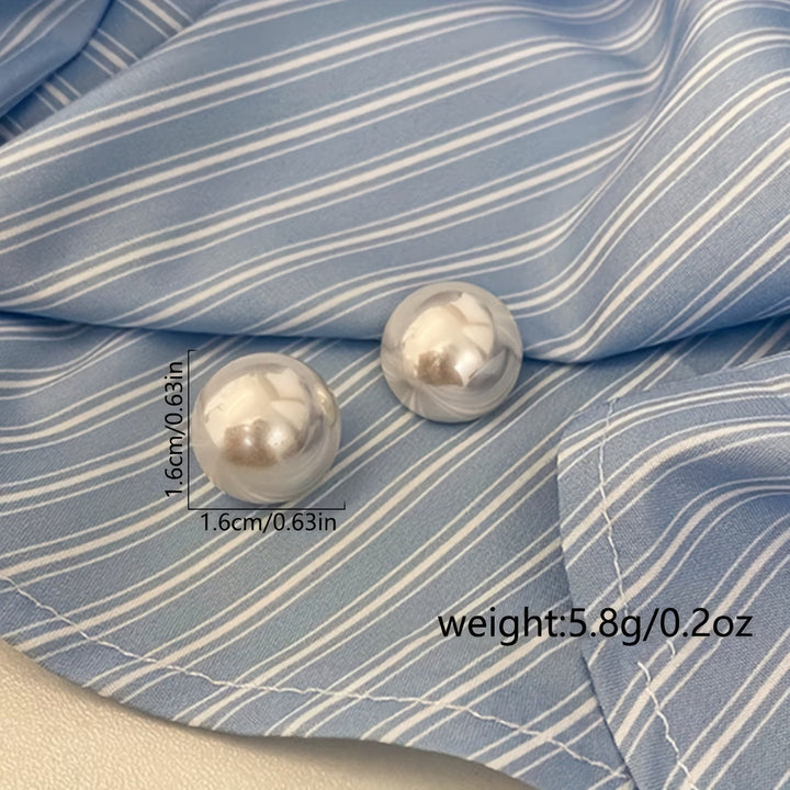 Les Boucles d'Oreilles à Pince avec Perle Statement