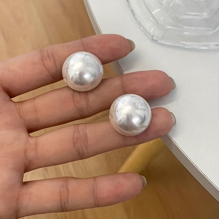 Les Boucles d'Oreilles à Pince avec Perle Statement
