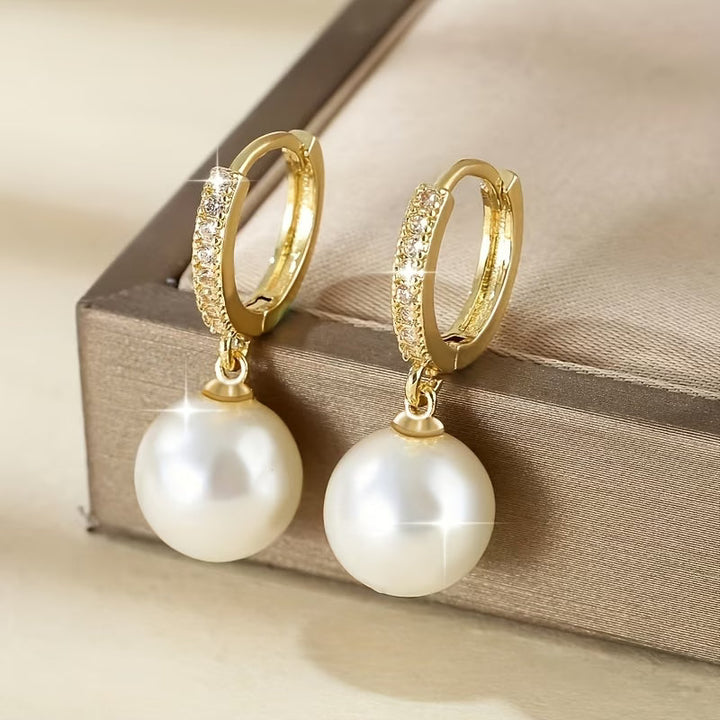 Les Boucles d'Oreilles en Goutte de Perle Moderne