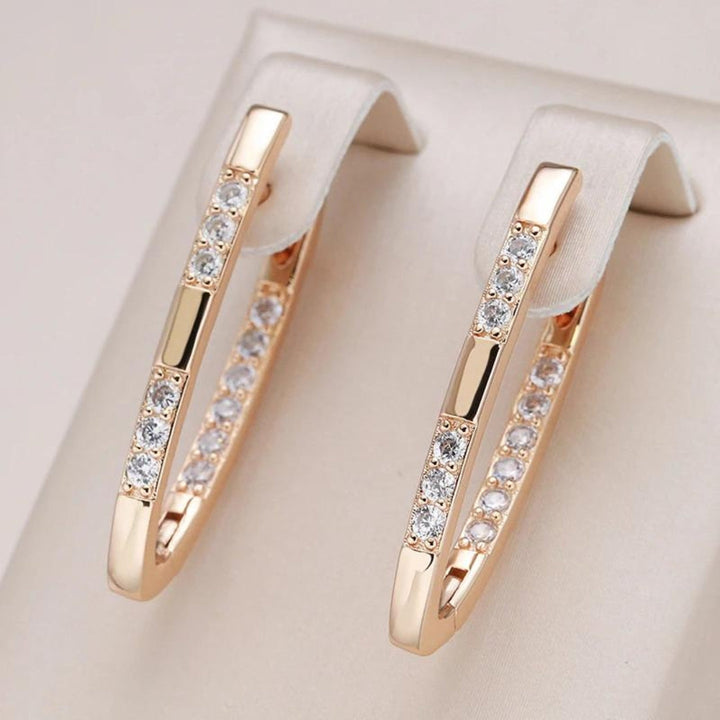 Boucles d'Oreilles Élégantes en Zirconia Dorée