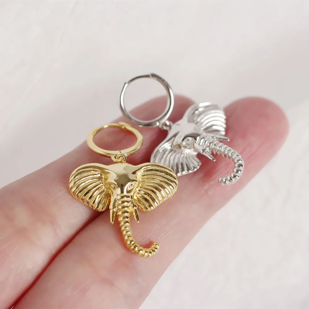 Boucles d'oreilles créoles avec pendentif éléphant