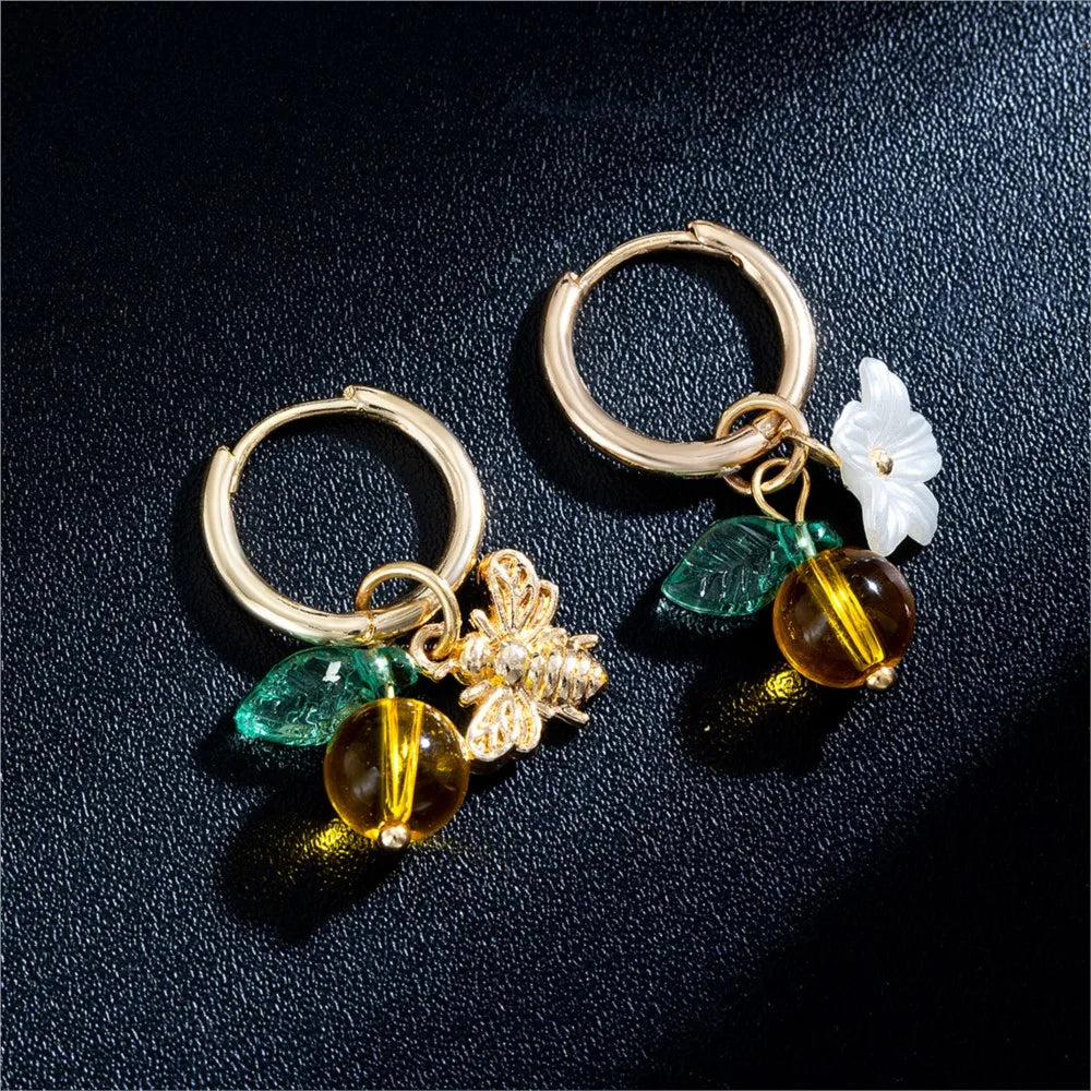 Boucles d'oreilles en forme de cerceau avec fleurs d'orange et abeilles