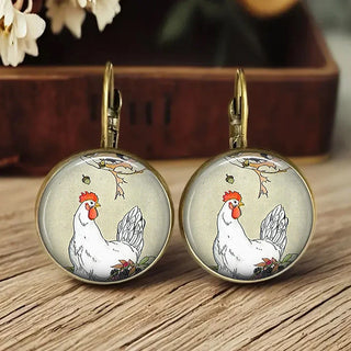 Boucles d'oreilles en verre sous dôme avec animaux fantaisistes