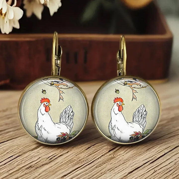 Boucles d'oreilles en verre sous dôme avec animaux fantaisistes
