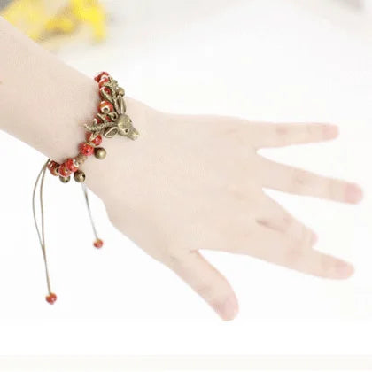 Bracelet en céramique fait main avec charme de faon