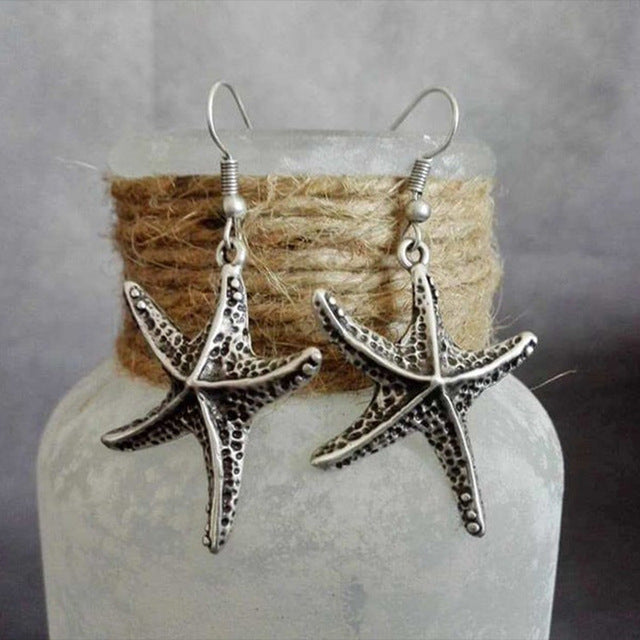 Boucles d'oreilles étoiles de mer en argent vintage