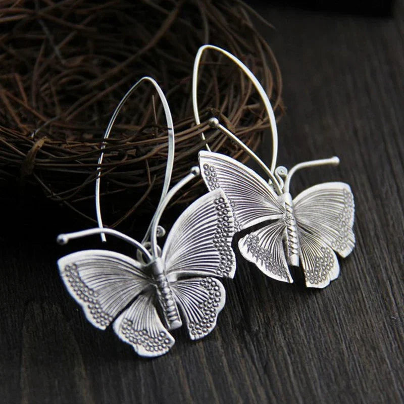 Boucles d'oreilles en argent vintage en forme de papillon