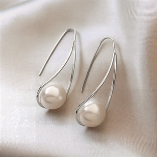Boucles d'Oreilles Élégantes en Perle Mystique