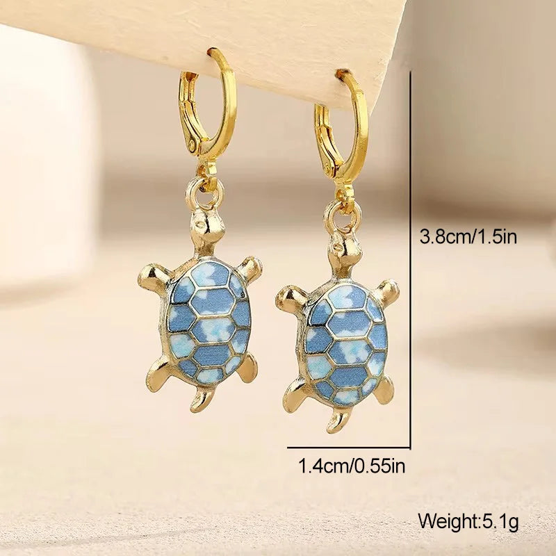Boucles d'oreilles Huggie Tortue de Mer Charme Océan
