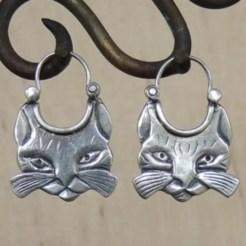 Boucles d'oreilles en argent avec moustaches de chat vintage