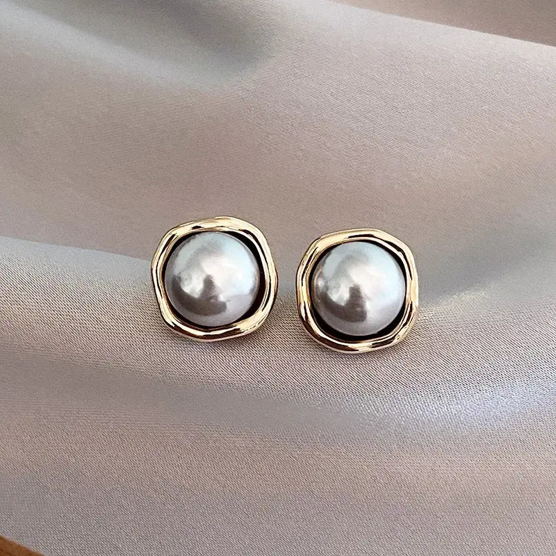 Boucles d'oreilles en perles noires de luxe