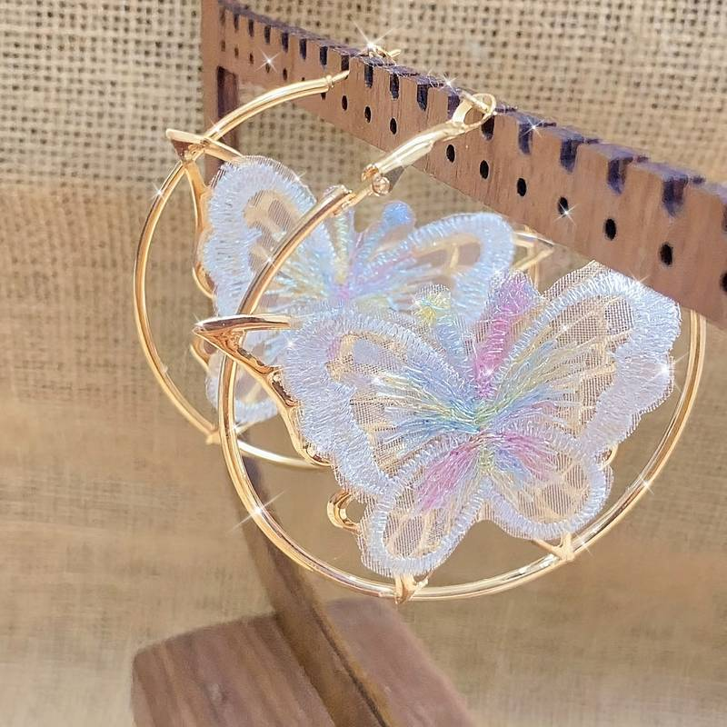Boucles d'oreilles créoles vintage en papillon blanc