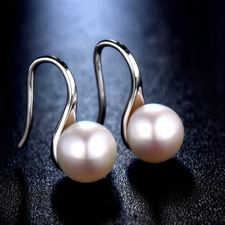 Les Boucles d'Oreilles en Perles Essentielles